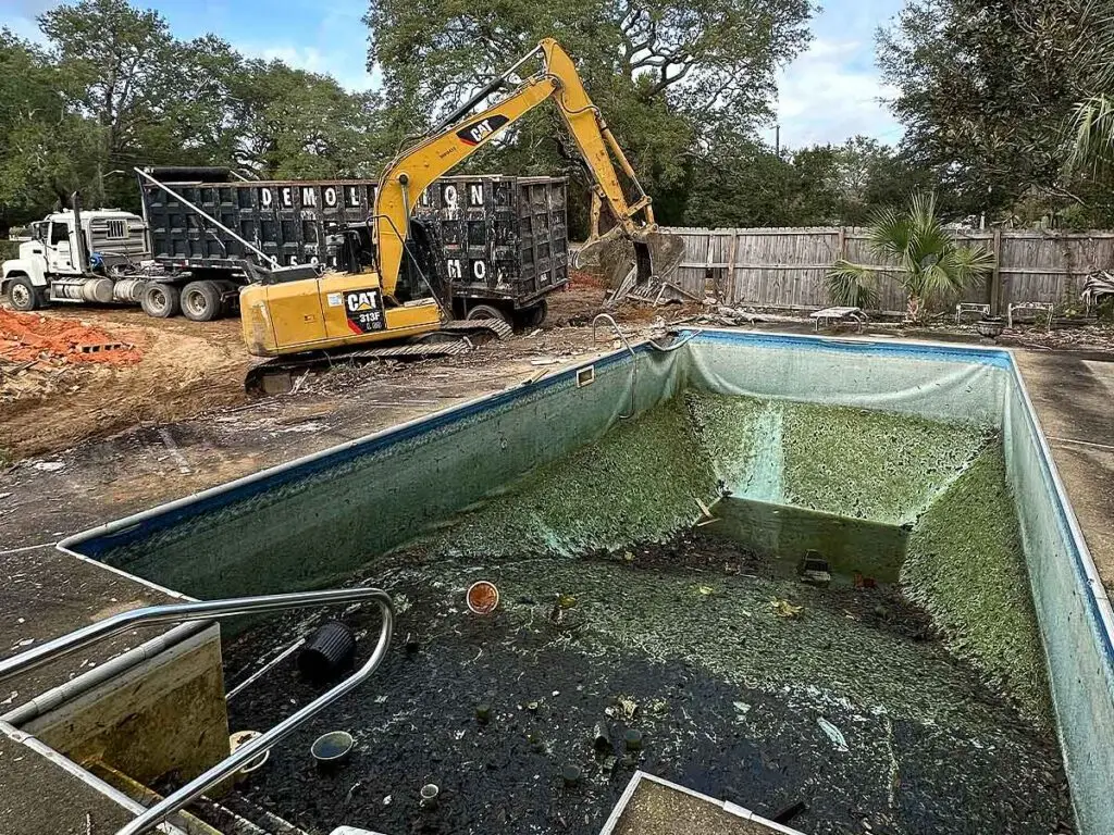 Pool demolition in progress