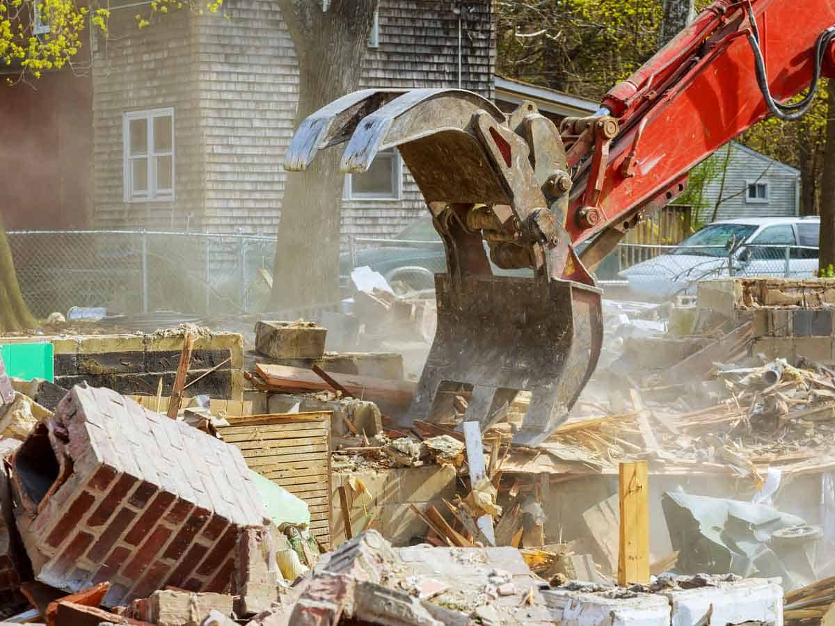 Home demolition in progress by house demolition contractors